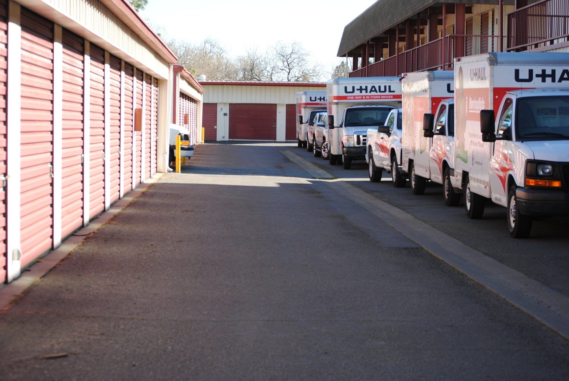 Stonegate Self Storage units and driveway with Uhaul trucks