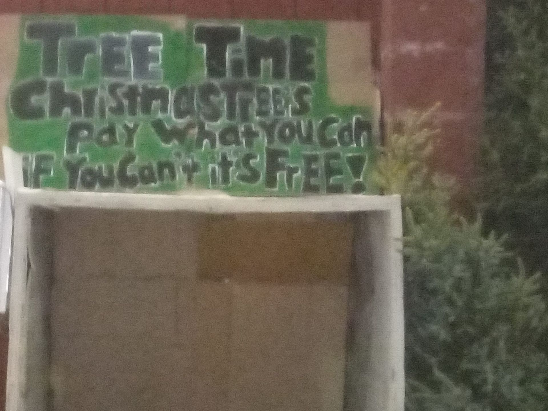 Sign on a cardboard box: 