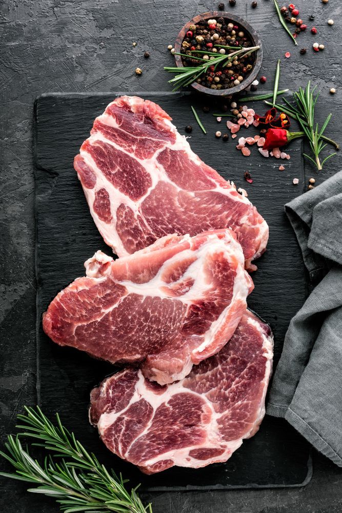 Raw Pork Shoulder Steaks With Rosemary, Pepper, and Pink Salt — CQ Butchers & Catering Supplies in Mackay, QLD