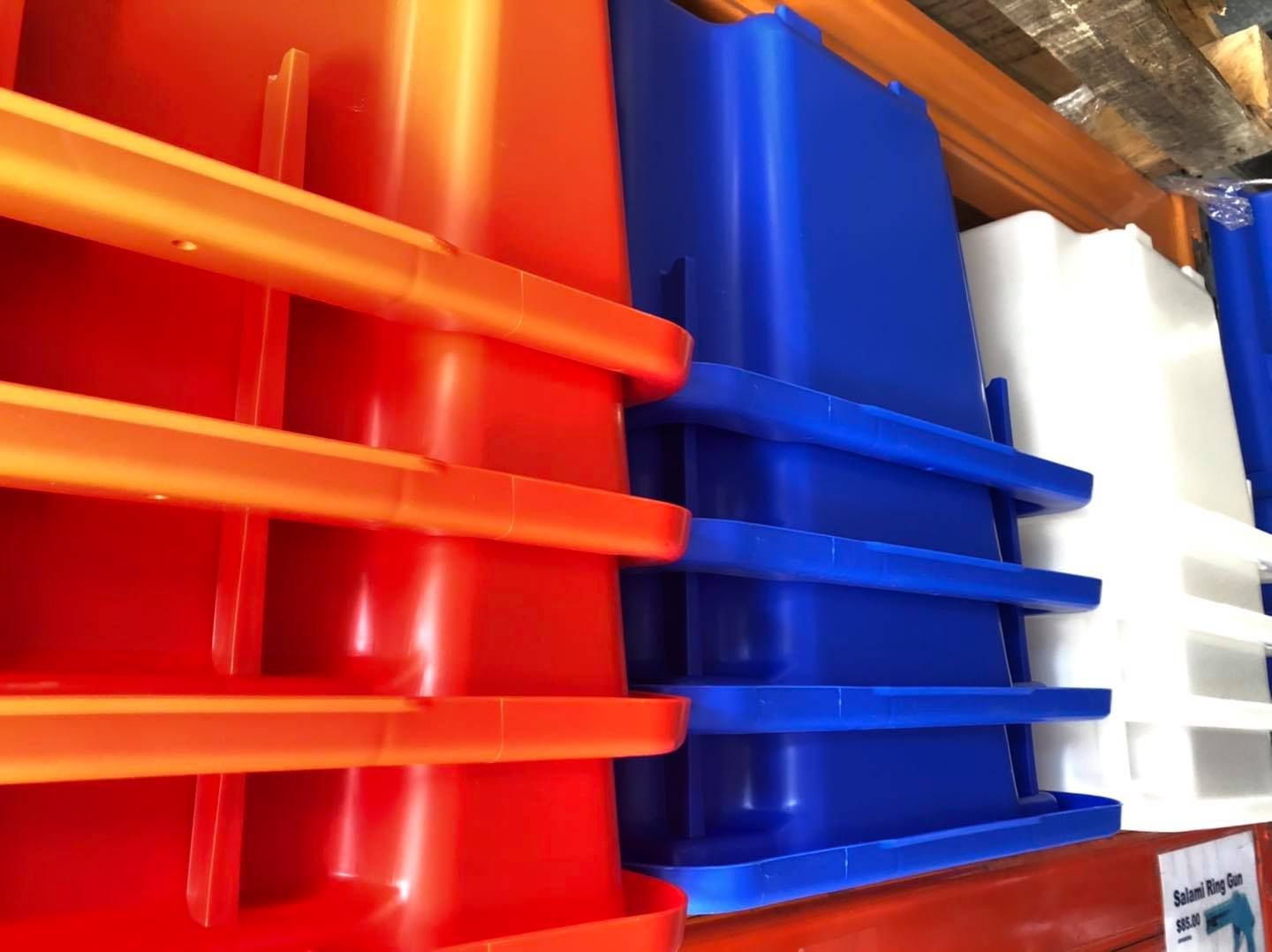 Stacked, Colourful Plastic Bins in Red, Blue, and White — CQ Butchers & Catering Supplies in Sarina, QLD