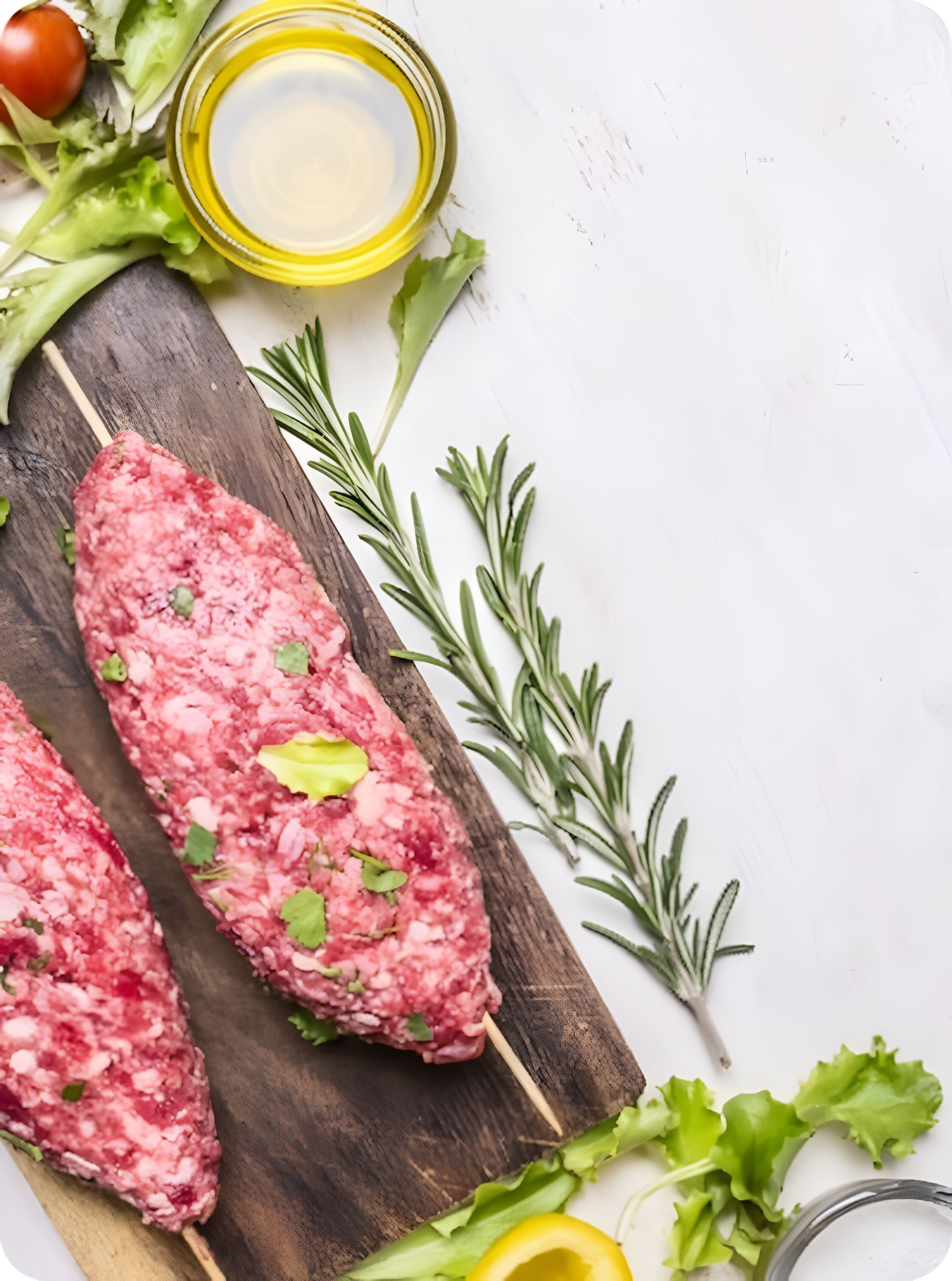 Raw Kebabs on Skewers, Wooden Cutting Board, Herbs, Oil, and Lemon — CQ Butchers & Catering Supplies in Mackay, QLD