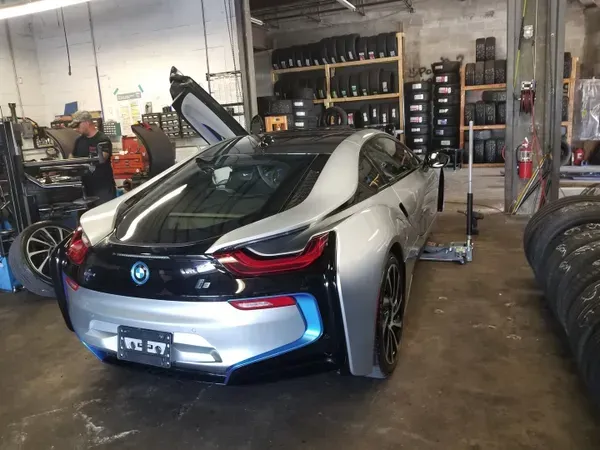 gallery back view car with door open | Precision Tires Auto