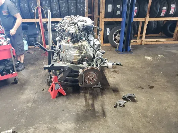 gallery engine and system on garage floor | Precision Tires Auto