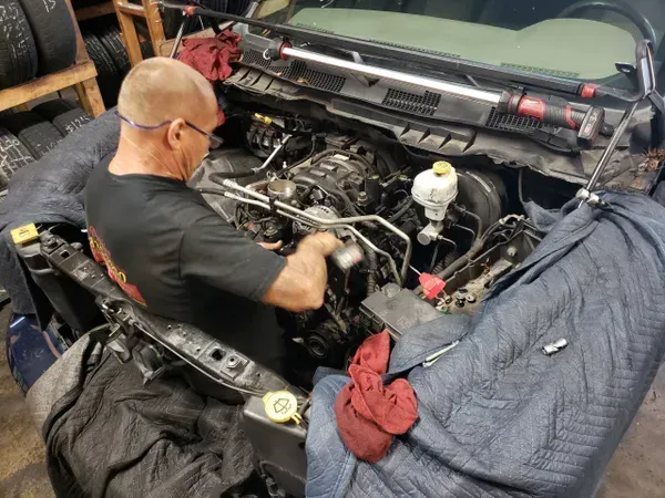 gallery mechanic at work in vehicle | Precision Tires Auto