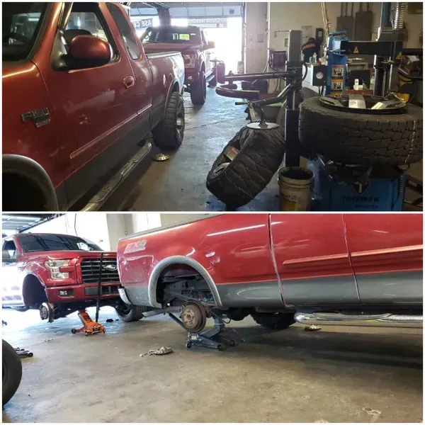 gallery red trucks in garage | Precision Tires Auto