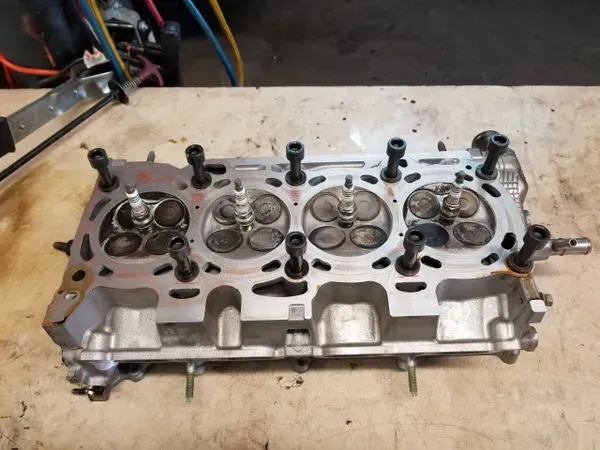 gallery up close to part examining | Precision Tires Auto