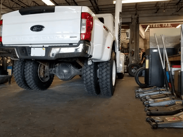 gallery white food truck large tires | Precision Tires Auto