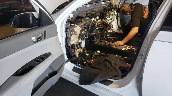 gallery white vehicle front dashboard removed in progress | Precision Tires Auto