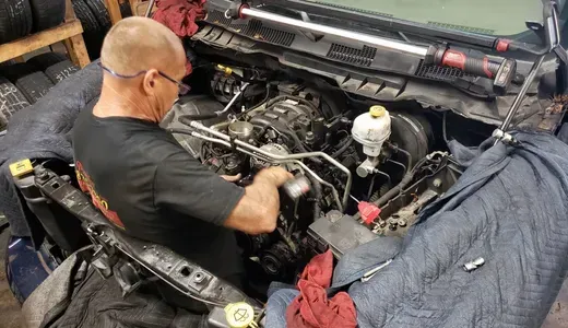 mechanic working on car | Precision Tires Auto