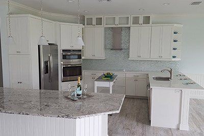 Cabinet Remodeling — Kitchen With Quartz Countertop in Vero Beach, FL