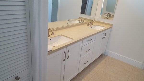 Bathroom Design — White Bathroom Cabinets in Vero Beach, FL