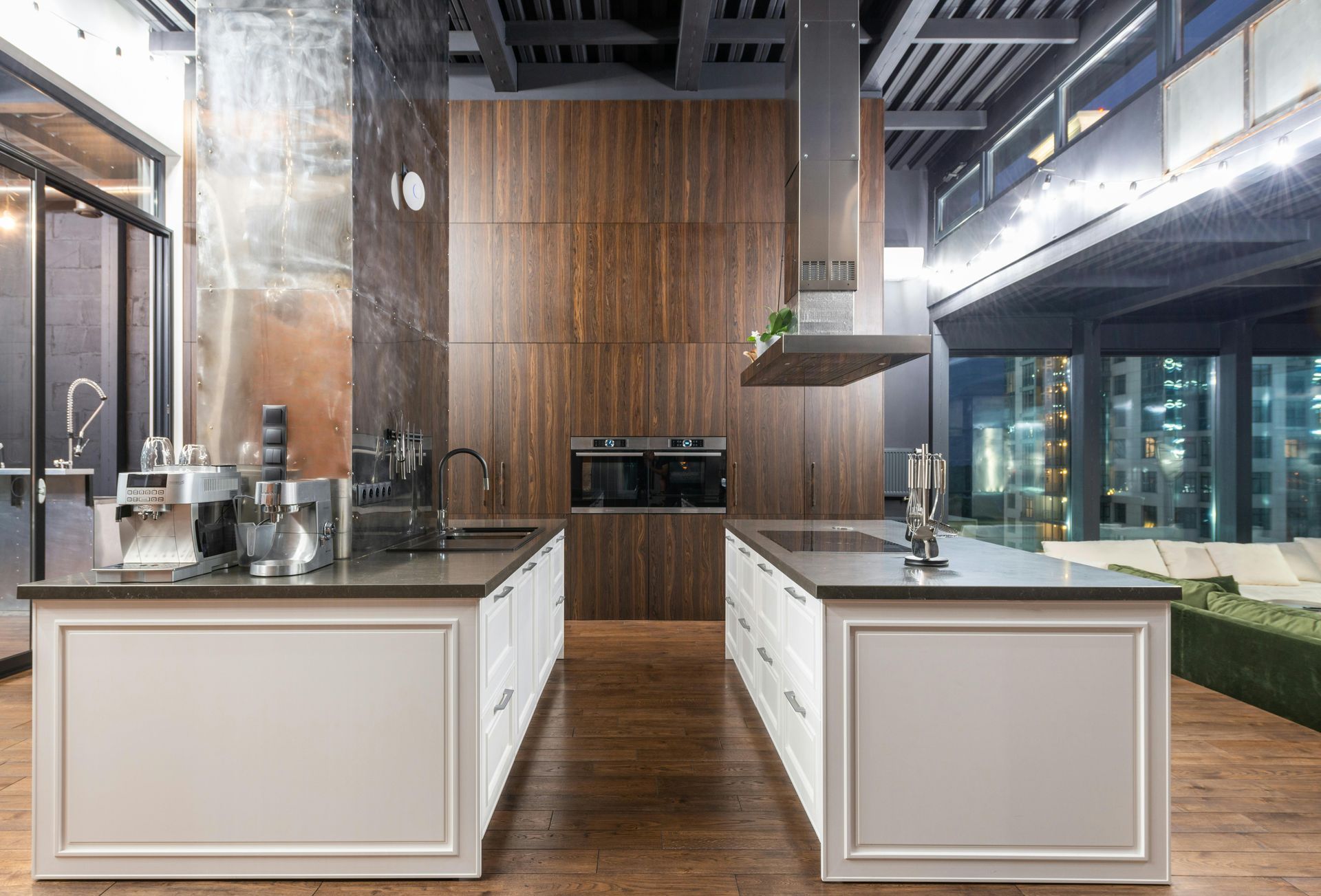 A modern kitchen with a large island in the middle of the room.
