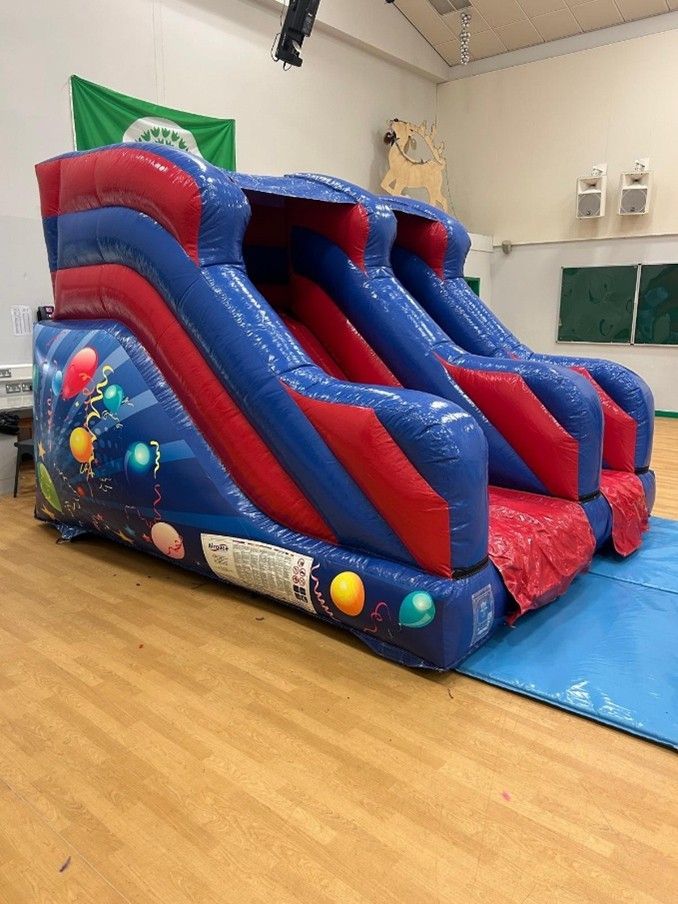 Blue and red inflatable slide