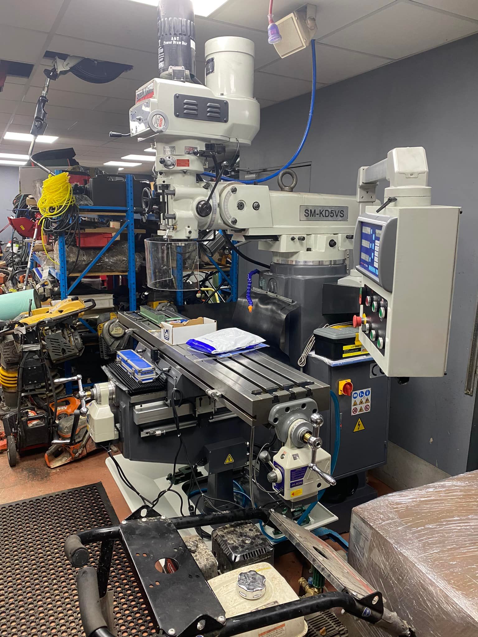 A machine is sitting on top of a table in a room.