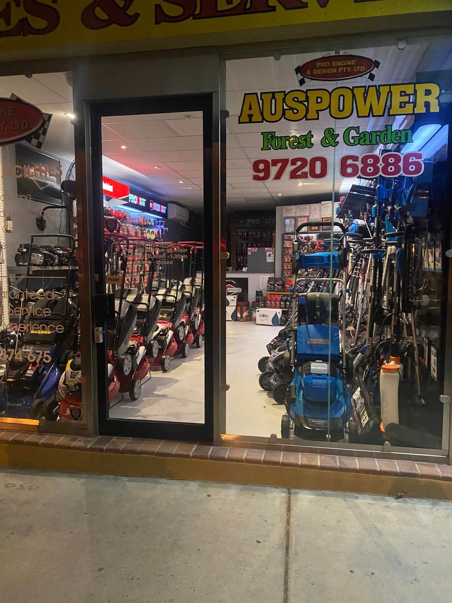 A store front with a sign that says ' auspower ' on it
