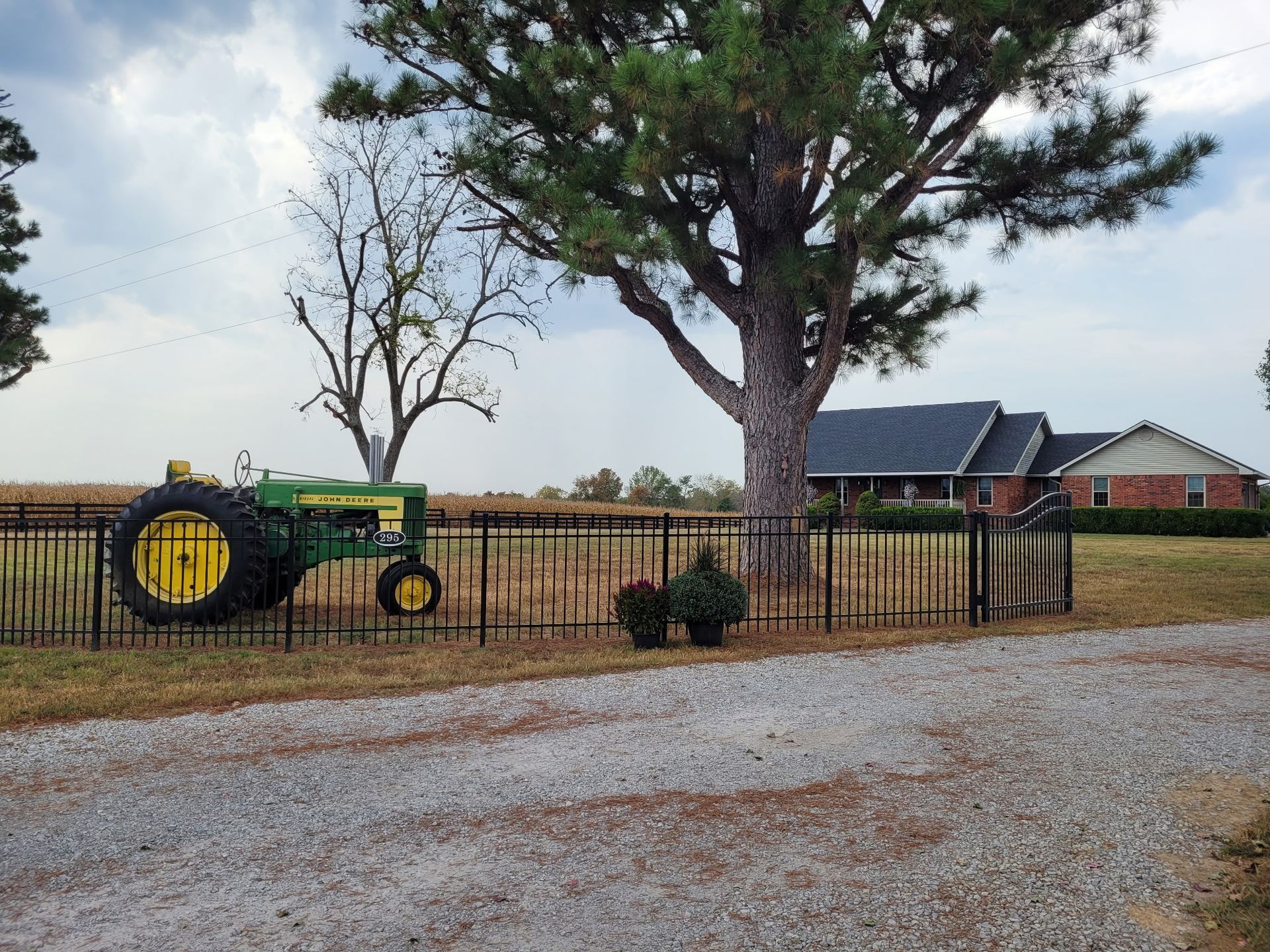 A wooden fence with a true grip sign on it