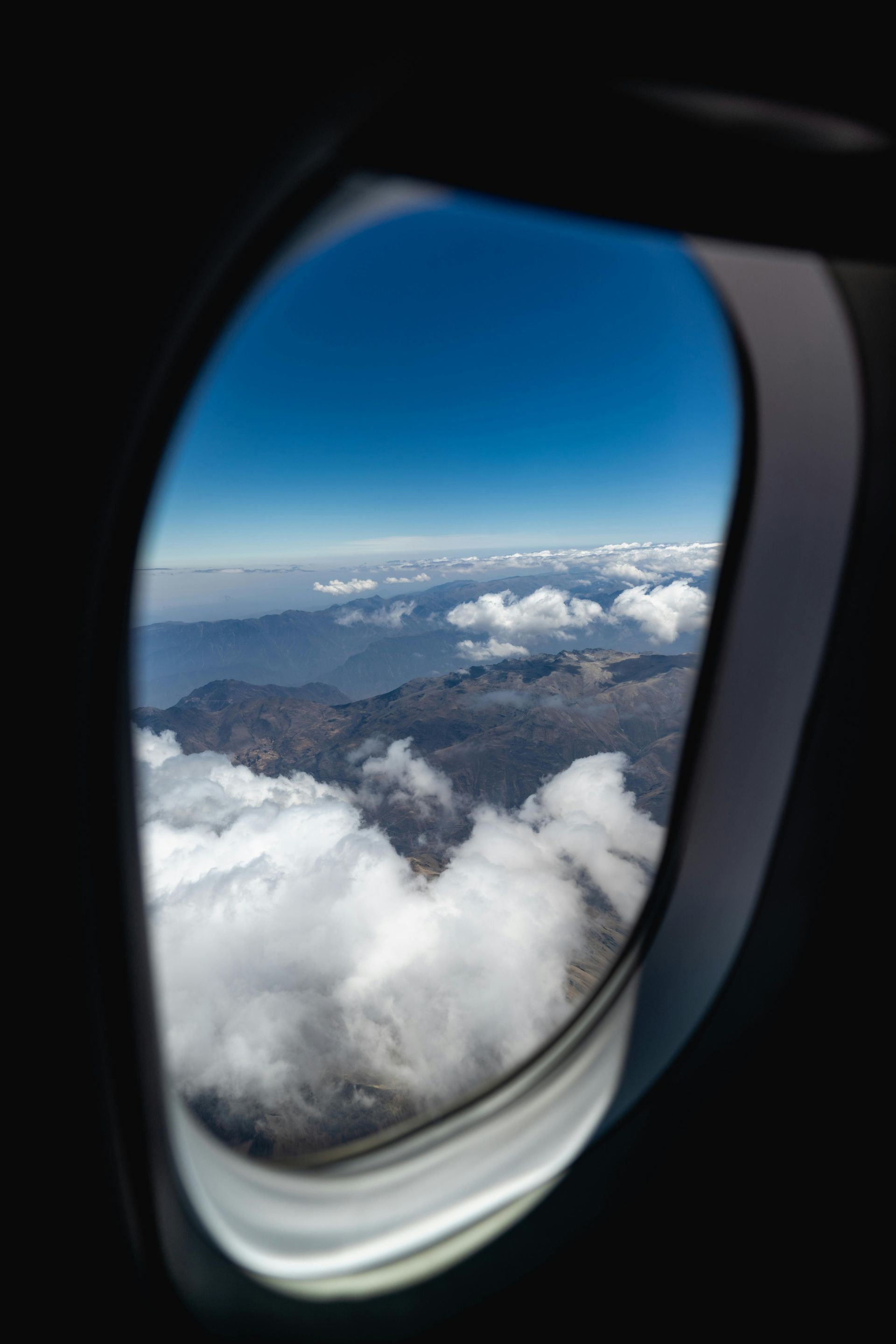 view of clouds from airplane window, incentive trip flights, incentive trip travel