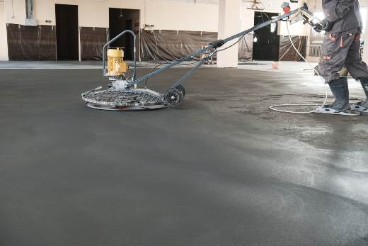 commercial concrete contractors Dallas smoothing to finish project