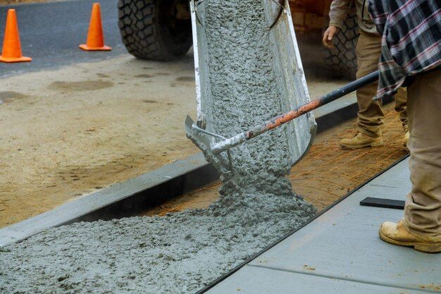 hardworking people mixing cement