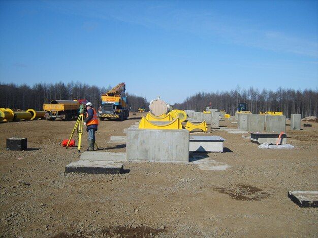 a man preparing the area for concreting