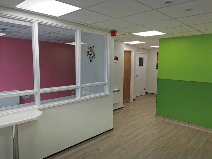 A black and white drawing of a kitchen with the letter f on it