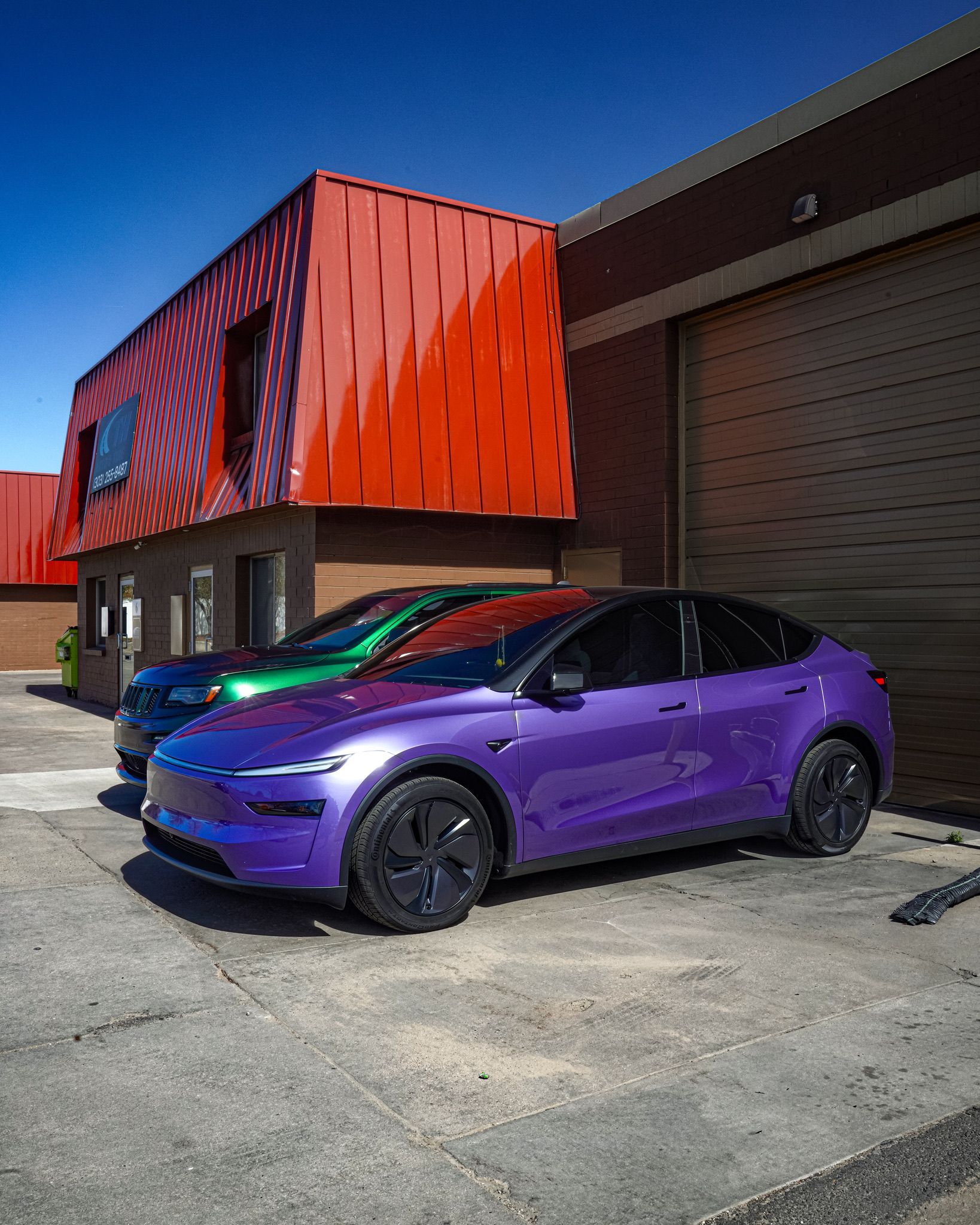 A white and yellow sports car on a black background.