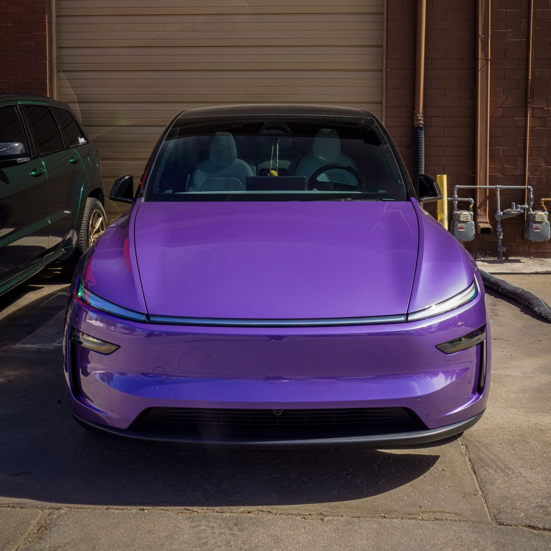 A white and yellow sports car on a black background.