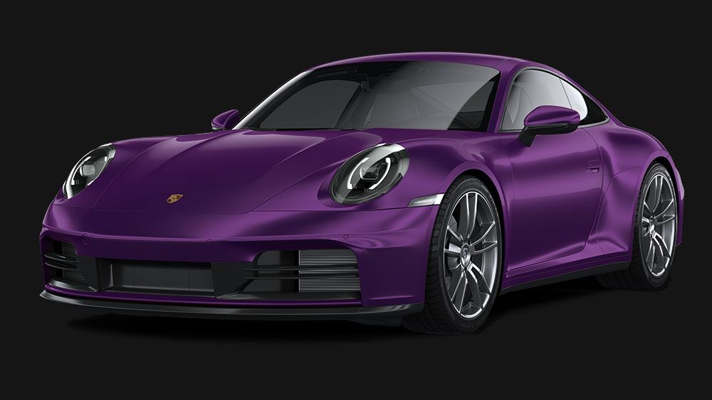 A yellow and white sports car on a black background.