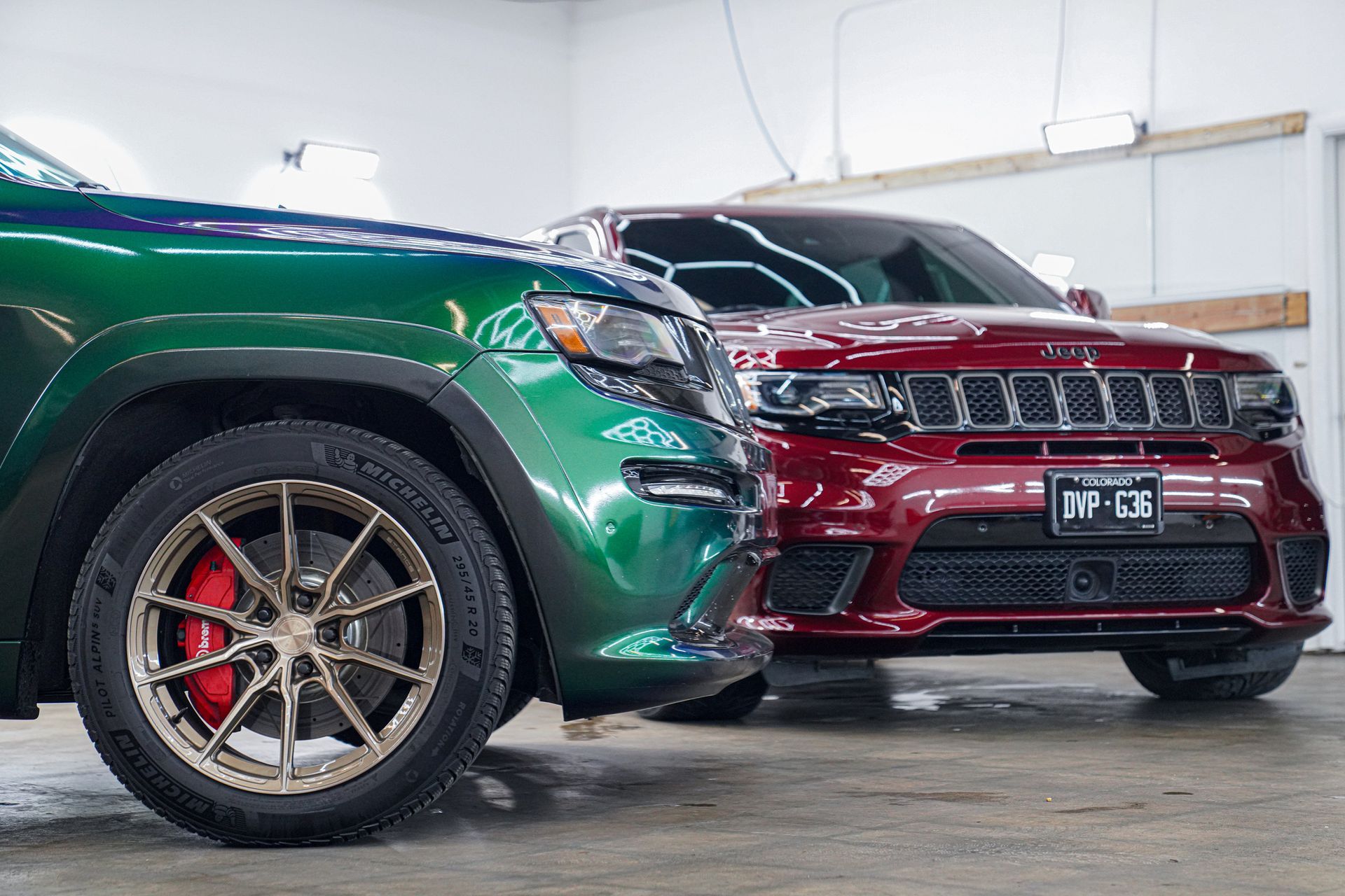 A white and yellow sports car on a black background.