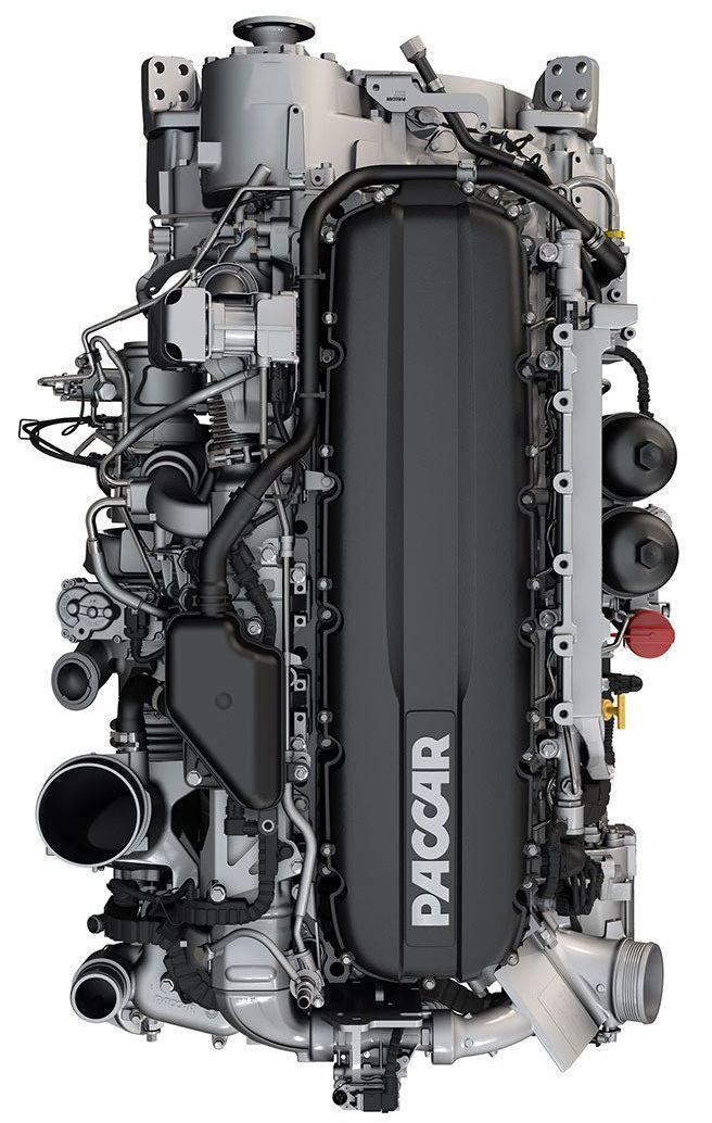 A Blue Semi Truck Is Driving Down a Highway at Sunset - McCook, Illinois - Diesel Force Truck Repair