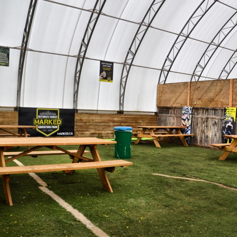 A picnic area with a sign that says marked