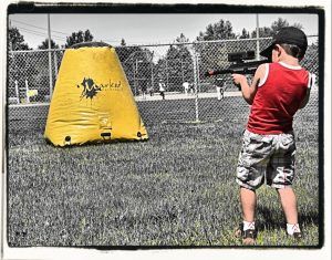 a boy playing laser tag