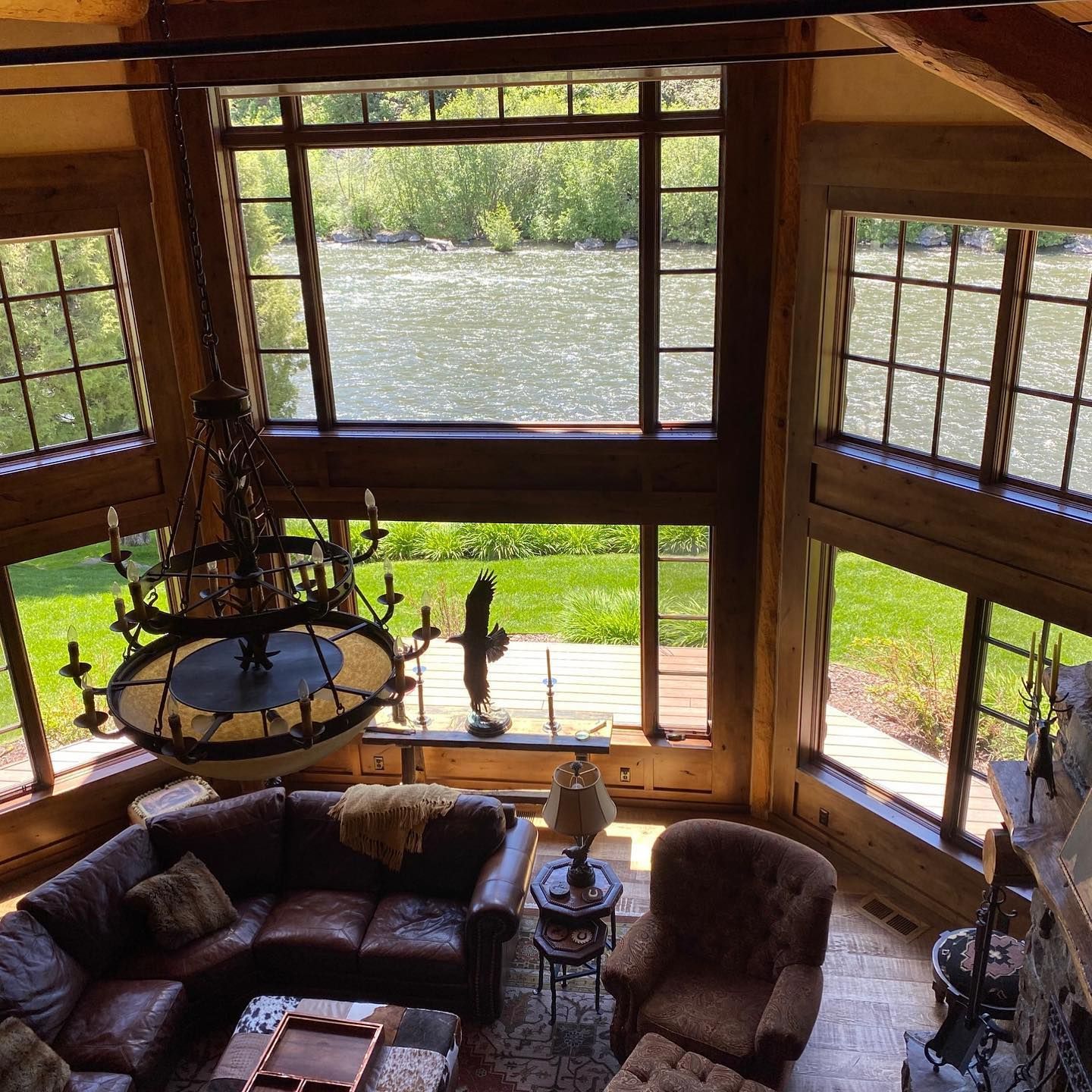 An aerial view of a living room with a couch and chairs