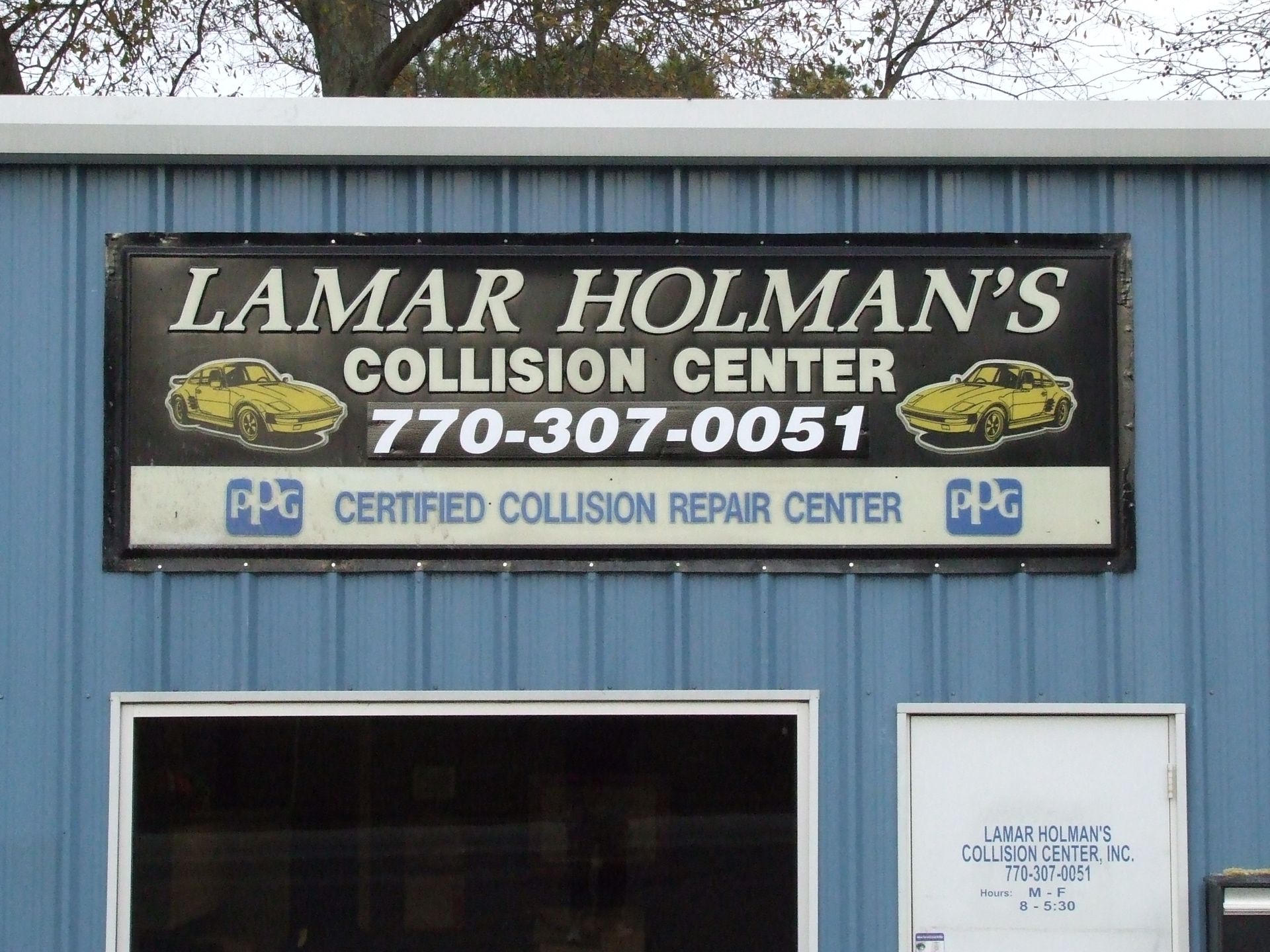 lamar holman 's collision center is a certified collision repair center