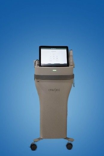 A machine with a tablet on top of it on a blue background.