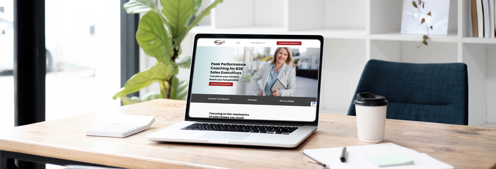 laptop on office desk with 3x5 coaching website on the screen