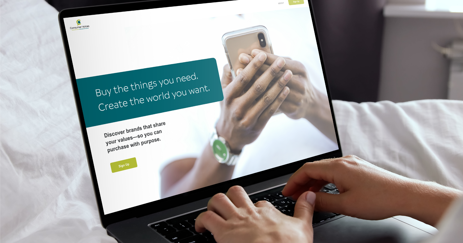 woman using laptop with Consumer Voices webiste on it