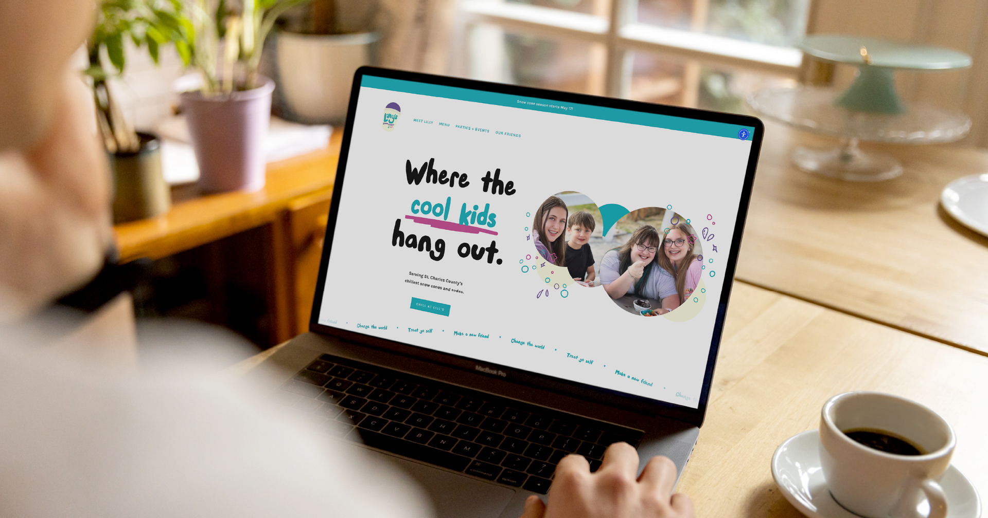 laptop on desk with snowcone website on the screen 