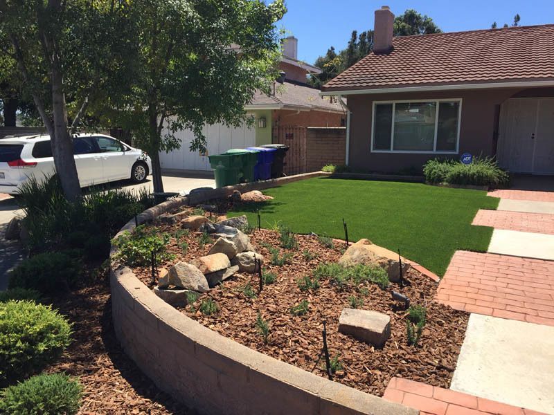 A house with a white van parked in front of it