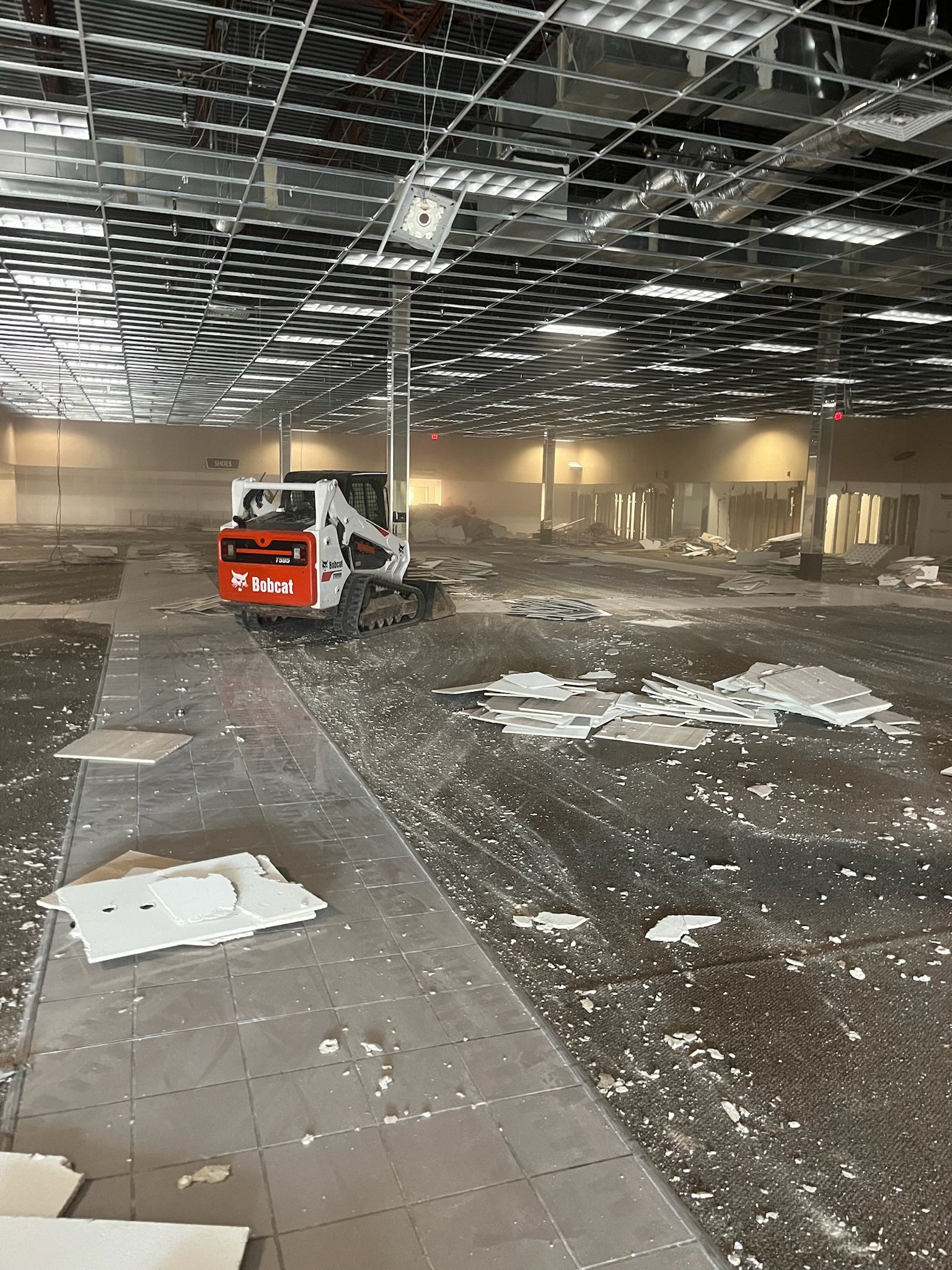 Warehouse demolition with skid steer in Greensboro, NC