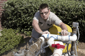 Man Repairing The Water Pump — Marion, OH — Ellsworth Well & Pump