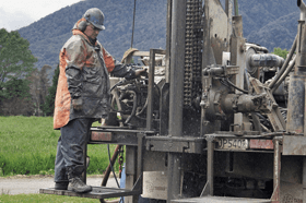 Man Drilling Using The Equipment — Marion, OH — Ellsworth Well & Pump