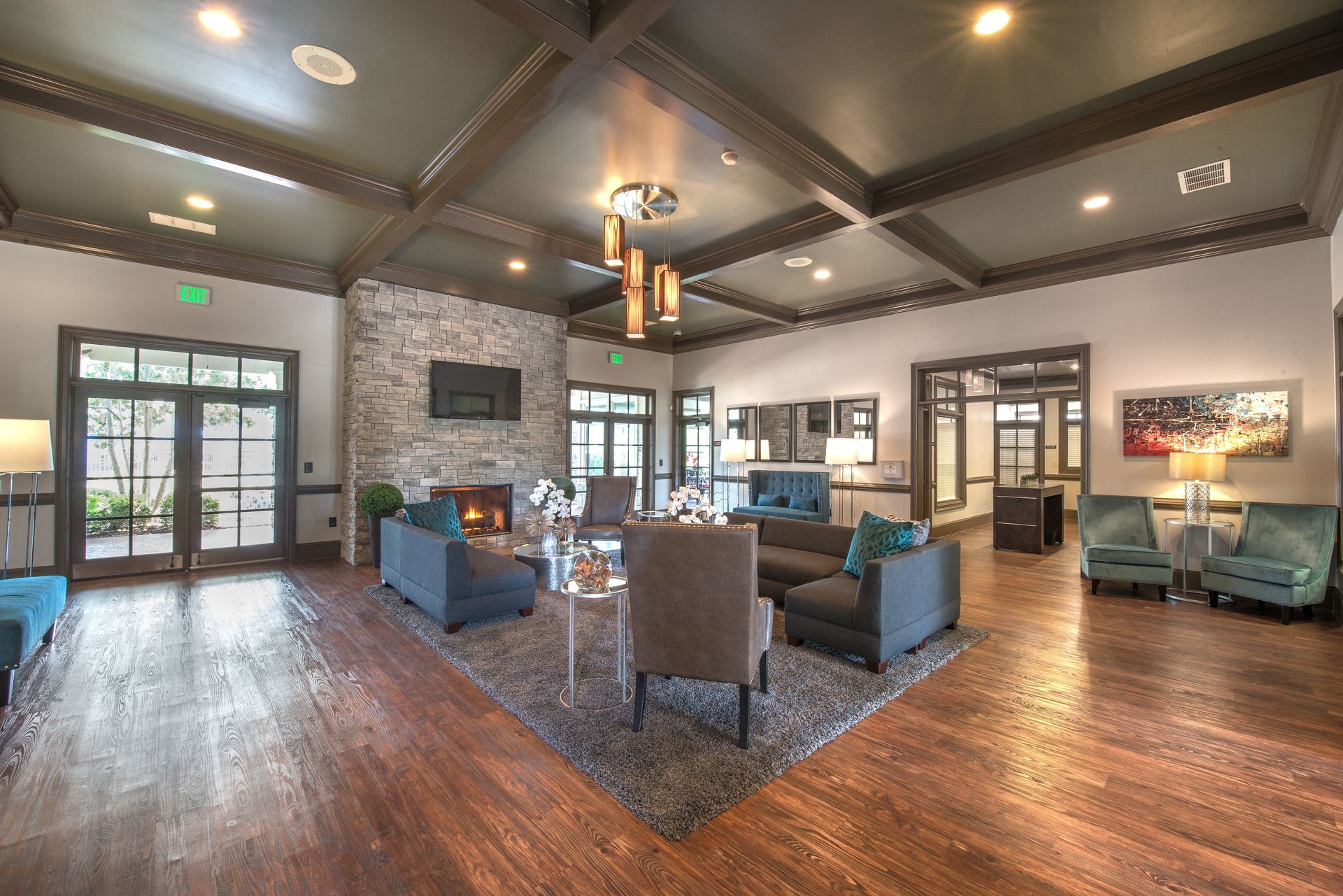 A picture of a mountain with a sun in the middle on a white background.