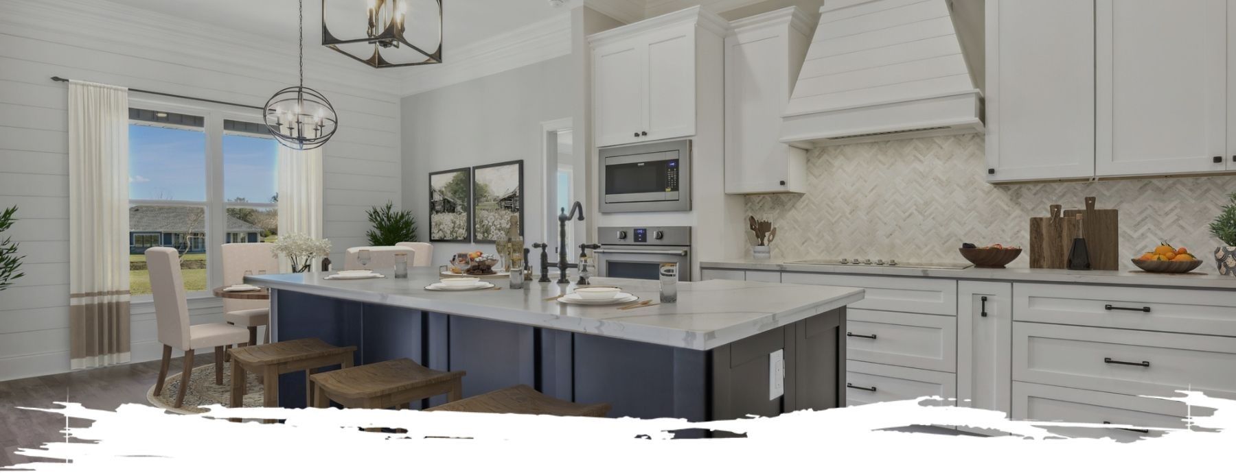 Modern kitchen with white cabinetry, blue island, and natural light from a large window.