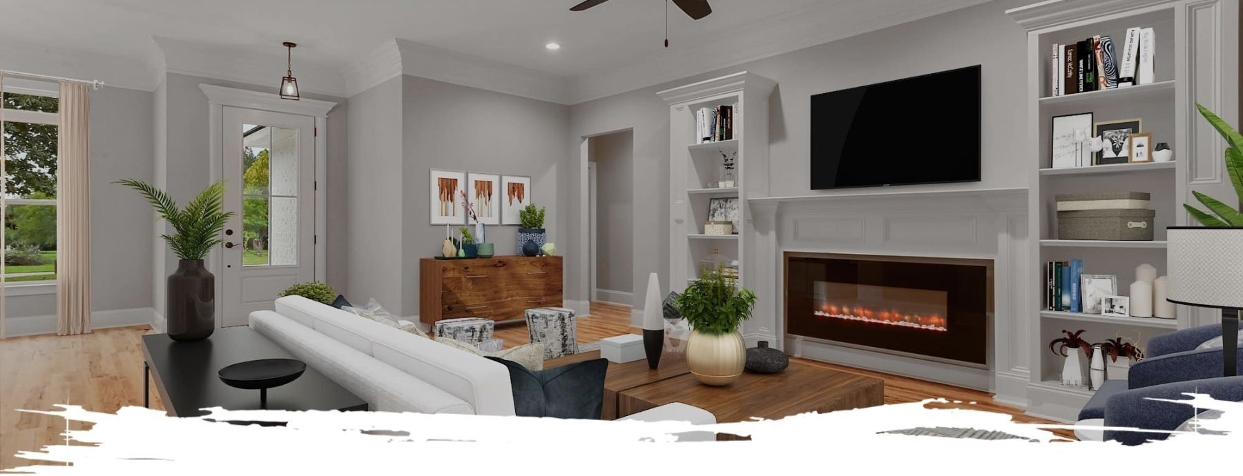 Living room with fireplace, bookshelves, white couch, and wooden accents.