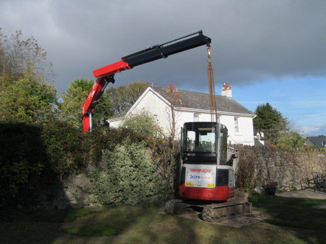 heavy machinery near a house