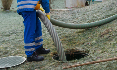 septic tank emptying process in progress