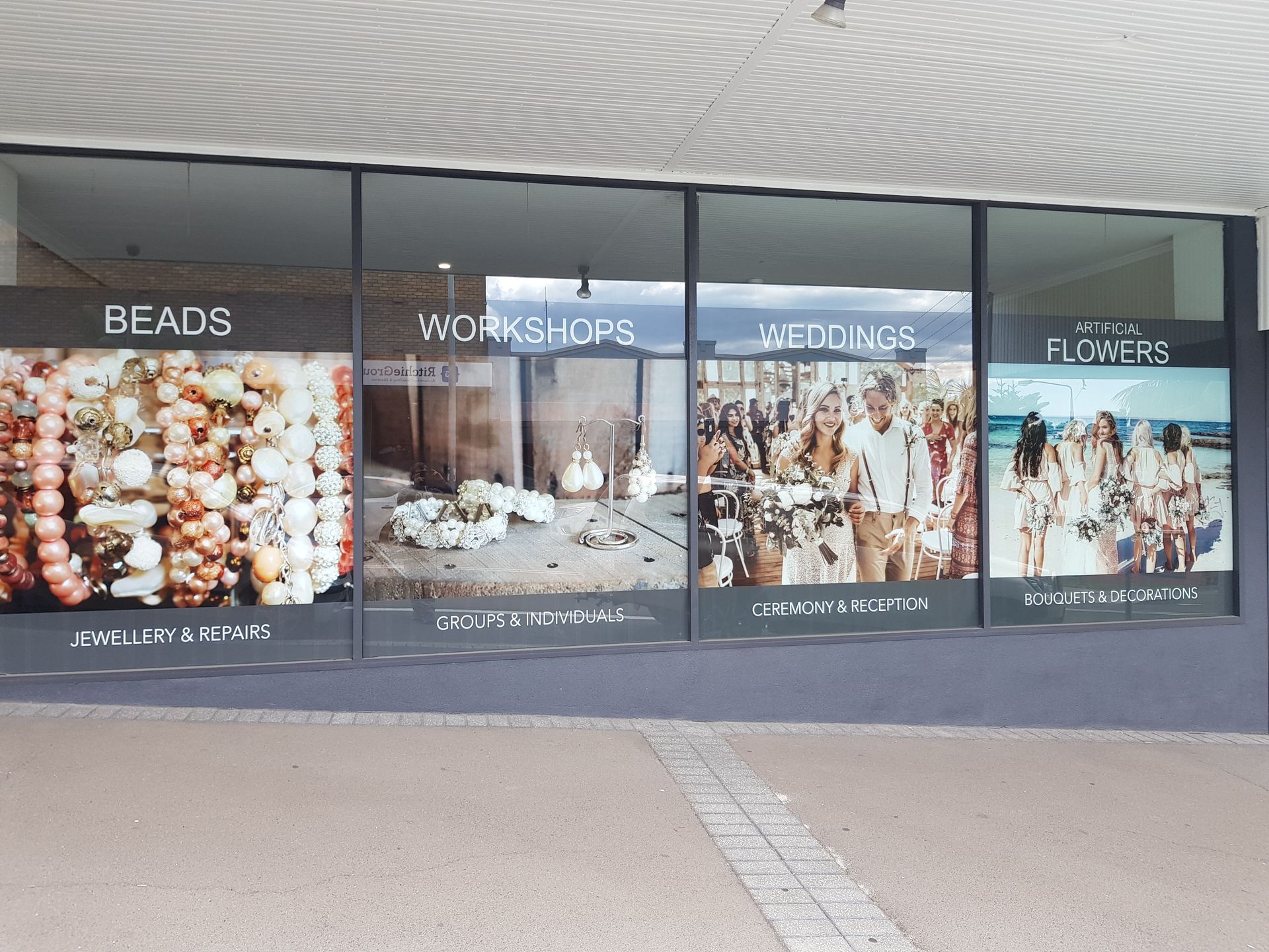 A sign with Poster — Professional Signwriter in the Illawarra