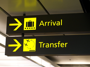 airport arrival and transfer signs