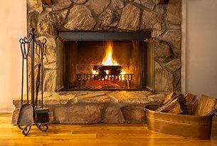 Living Room Brown Fireplace | Ashland, MA | Lunkers Outfitters